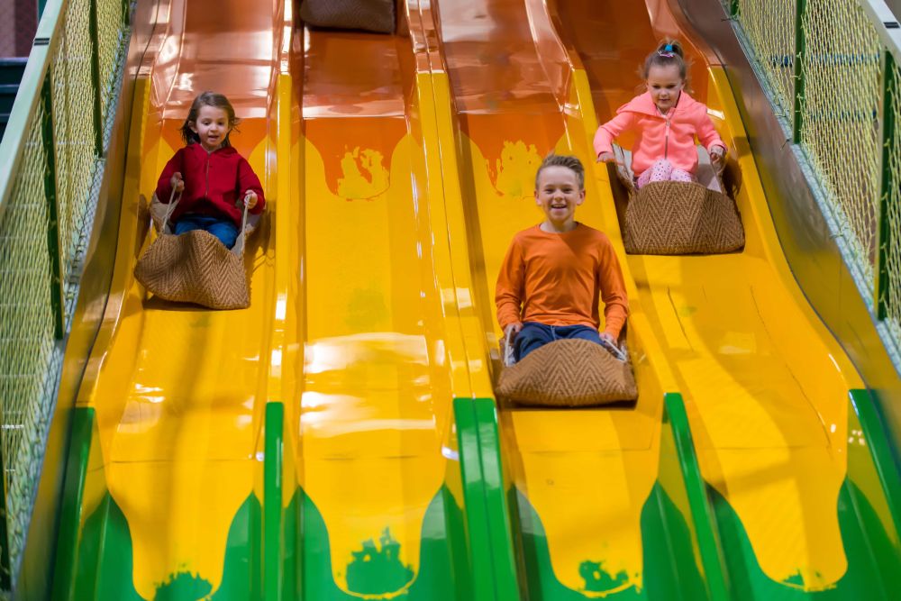 Kids racing on a slide
