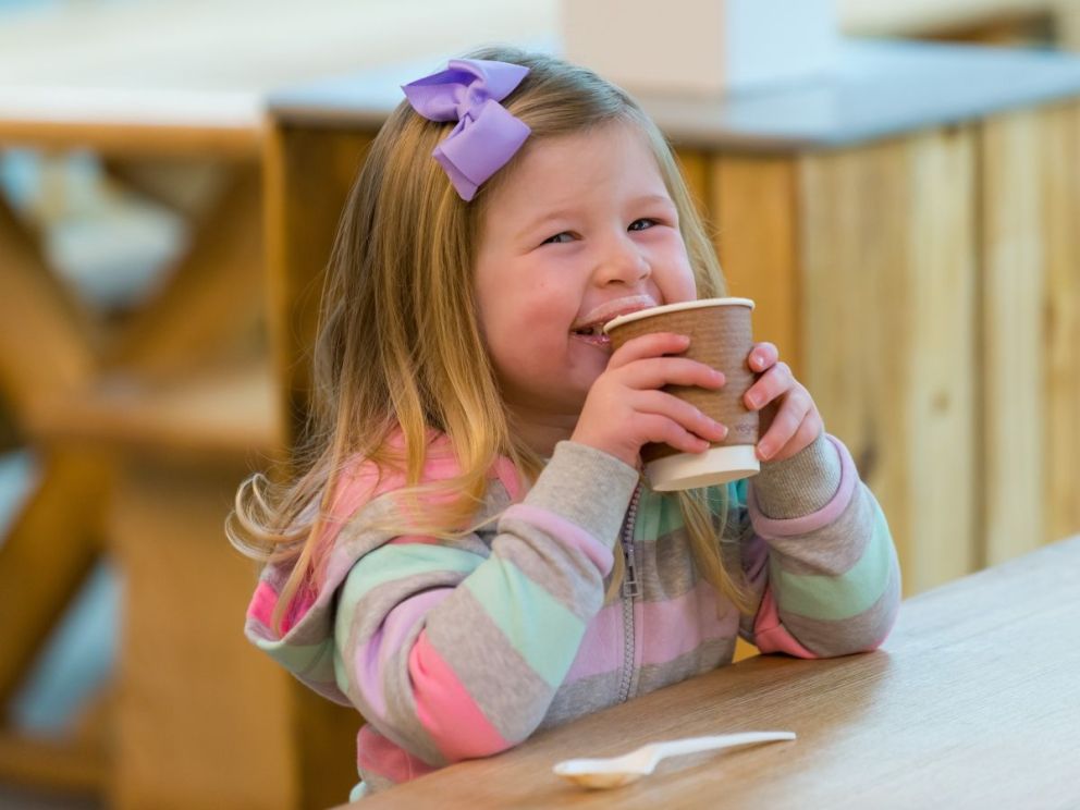 Girl drinking hot drink