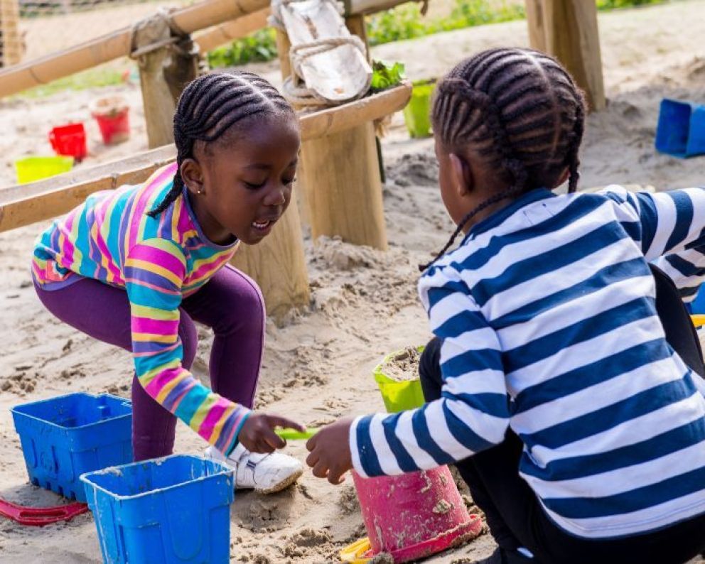 Kids playing in the sand